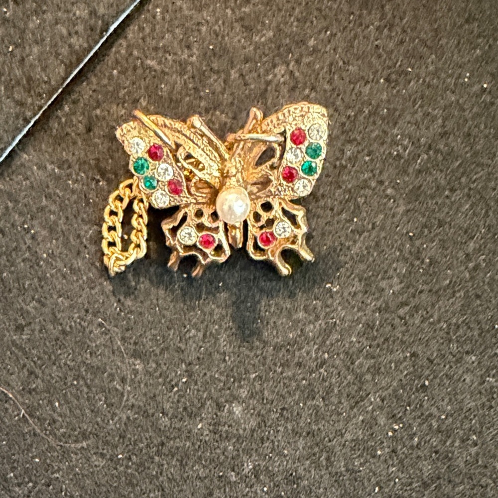 Gold Butterfly Brooch with Red and Green Accents